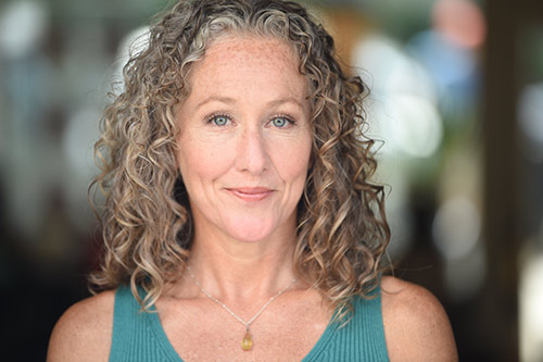 Studio headshot of Andrea Beaman